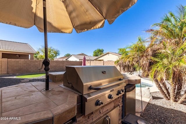 view of patio featuring grilling area