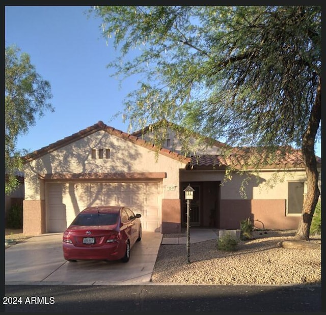 view of front of property featuring a garage