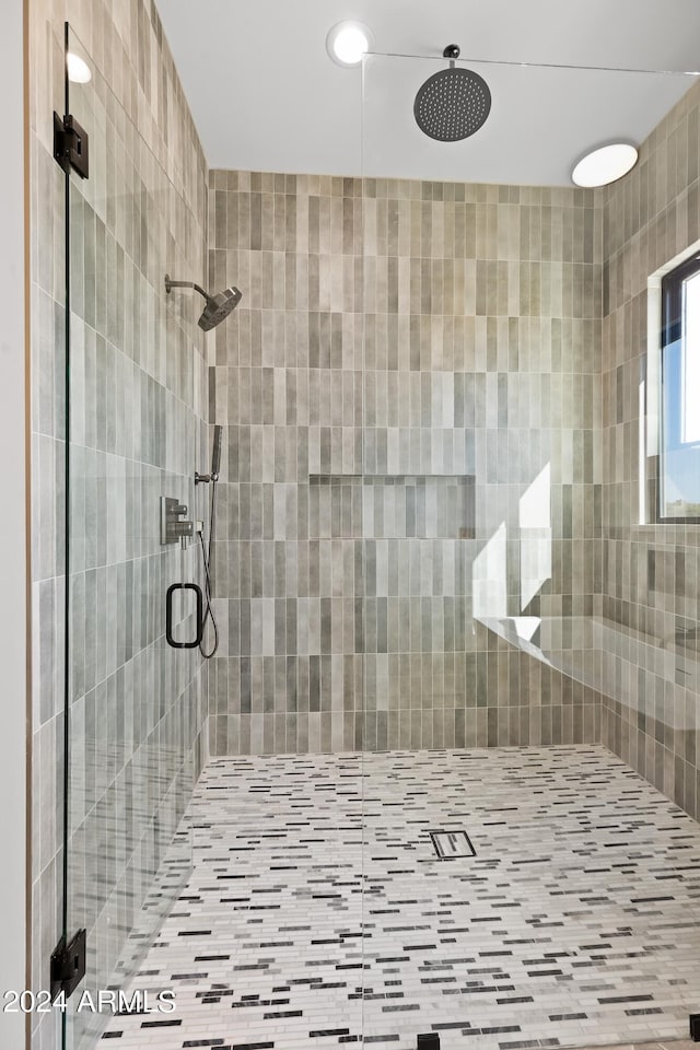 bathroom featuring walk in shower