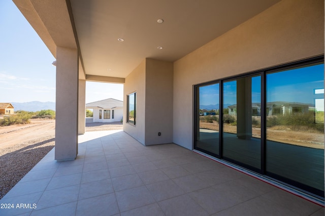 view of patio featuring a mountain view