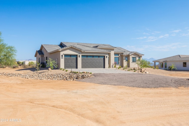 view of front of home with a garage