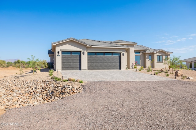 prairie-style house with a garage