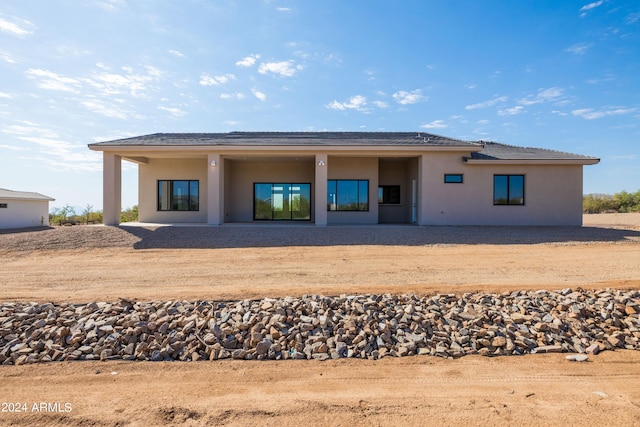 rear view of property with a patio