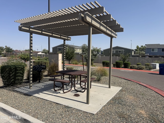 2339 E University Dr Unit 19, Mesa, AZ 85213 - view of patio / terrace with a pergola and a residential view