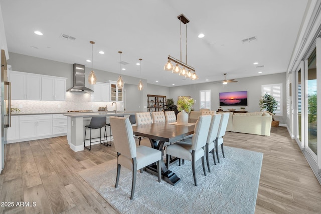 17565 E Blaze Ln, Rio Verde, AZ 85263 - dining room with recessed lighting, light wood-style flooring, and ceiling fan