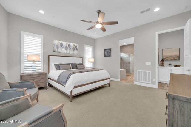 17565 E Blaze Ln, Rio Verde, AZ 85263 - bedroom with baseboards, light carpet, connected bathroom, recessed lighting, and ceiling fan