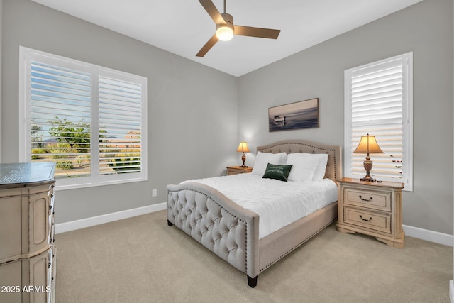 17565 E Blaze Ln, Rio Verde, AZ 85263 - bedroom featuring light colored carpet, baseboards, and a ceiling fan