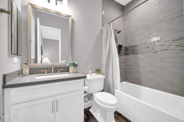 17565 E Blaze Ln, Rio Verde, AZ 85263 - bathroom featuring toilet, vanity, shower / bath combo with shower curtain, and wood finished floors