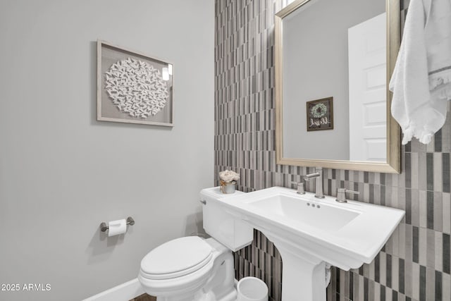 17565 E Blaze Ln, Rio Verde, AZ 85263 - half bath with toilet, baseboards, and a sink