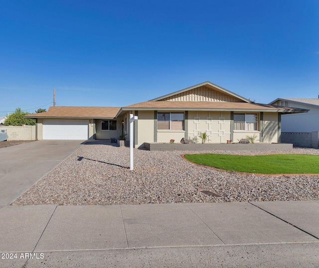 single story home with a garage