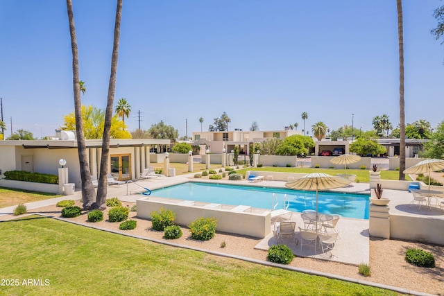 8726 E Devonshire Ave, Scottsdale, AZ 85251 - community pool featuring a yard, fence, a patio, and french doors