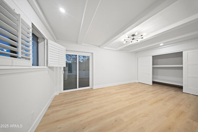 15641 E Sycamore Dr, Fountain Hills, AZ 85268 - unfurnished bedroom with a chandelier, wood finished floors, baseboards, access to exterior, and beam ceiling