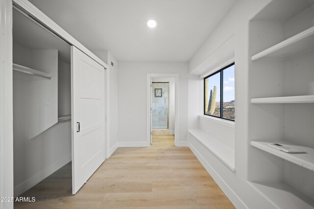 15641 E Sycamore Dr, Fountain Hills, AZ 85268 - hallway featuring light wood finished floors, baseboards, and recessed lighting