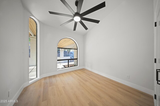 15641 E Sycamore Dr, Fountain Hills, AZ 85268 - unfurnished room with wood finished floors, a ceiling fan, baseboards, and lofted ceiling