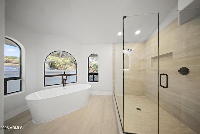 15641 E Sycamore Dr, Fountain Hills, AZ 85268 - full bathroom featuring a freestanding tub, a stall shower, baseboards, and recessed lighting