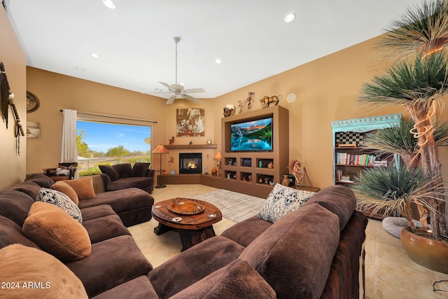 tiled living room with ceiling fan