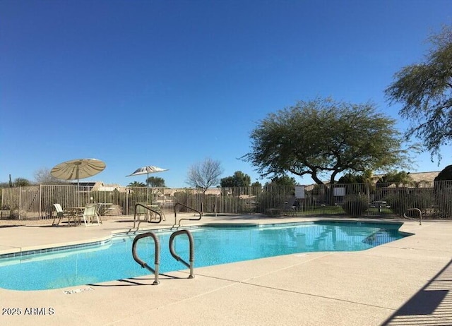 view of pool with a patio area