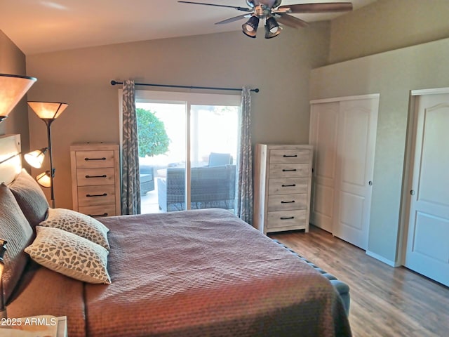 bedroom featuring ceiling fan, lofted ceiling, hardwood / wood-style flooring, and access to outside