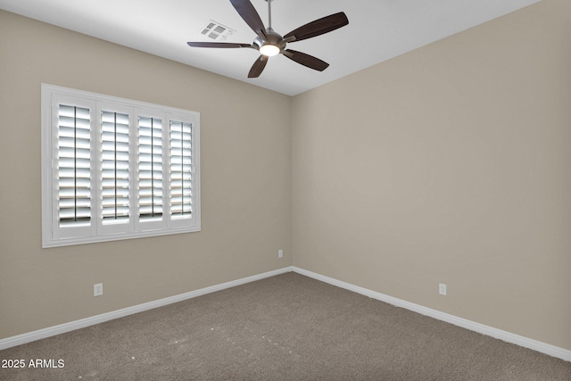 carpeted empty room with ceiling fan