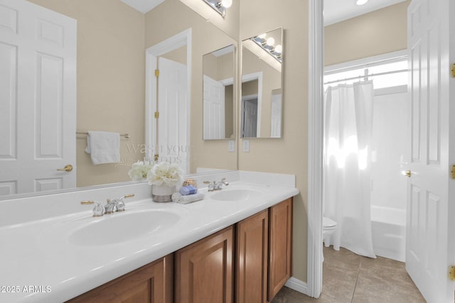 full bathroom featuring tile patterned flooring, vanity, shower / bath combination with curtain, and toilet