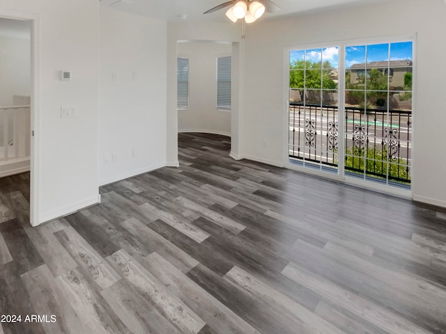 spare room featuring ceiling fan and wood-type flooring