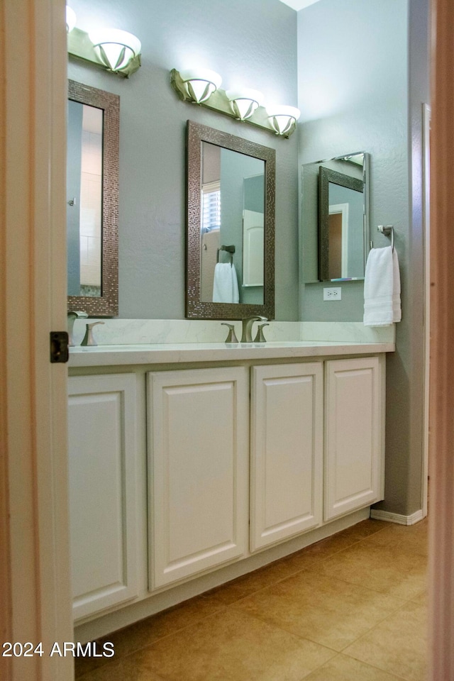 bathroom featuring vanity and tile patterned floors