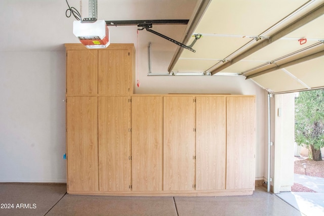 garage featuring a garage door opener