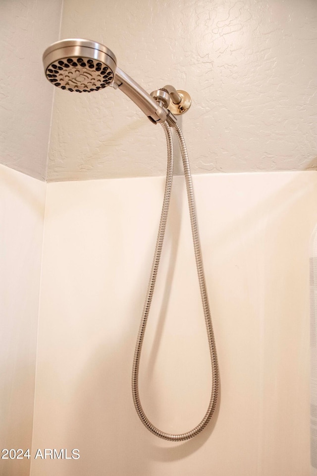 room details featuring walk in shower