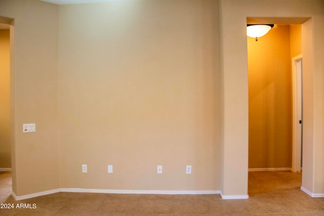 view of tiled spare room