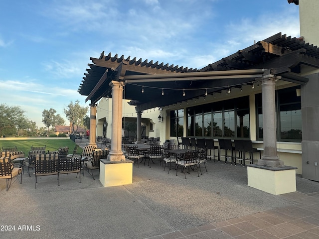 view of patio featuring a pergola