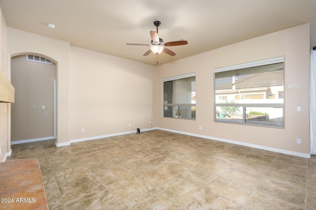 spare room featuring ceiling fan