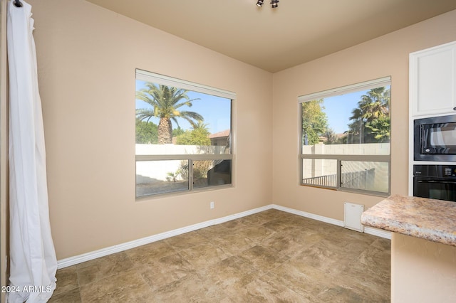 view of unfurnished dining area