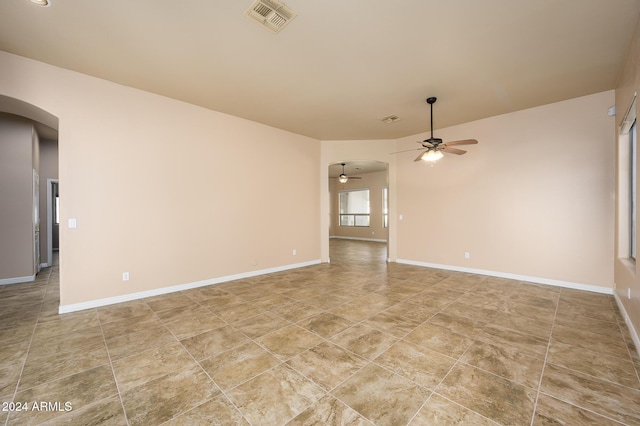 spare room featuring ceiling fan