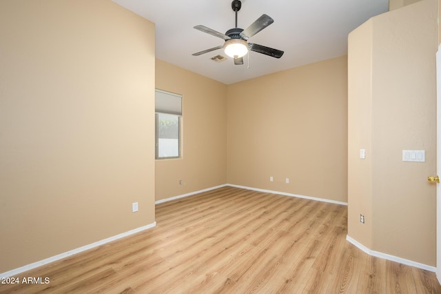 unfurnished room featuring ceiling fan and light hardwood / wood-style floors