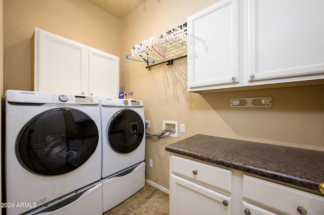 laundry area with cabinets and separate washer and dryer