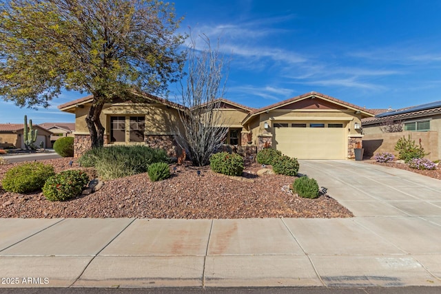 view of front of property with an attached garage, a tile roof, stone siding, driveway, and stucco siding