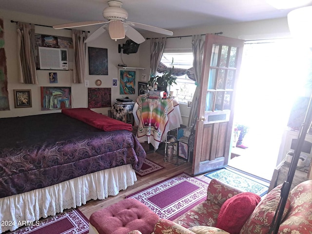 bedroom featuring wood finished floors and a ceiling fan