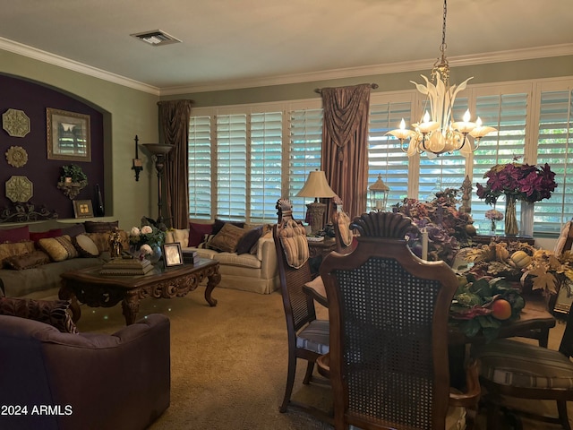 carpeted dining room with an inviting chandelier and crown molding