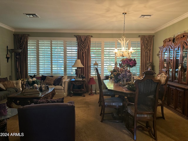 carpeted dining area featuring a notable chandelier and ornamental molding