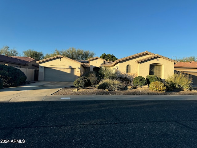 view of front of property with a garage