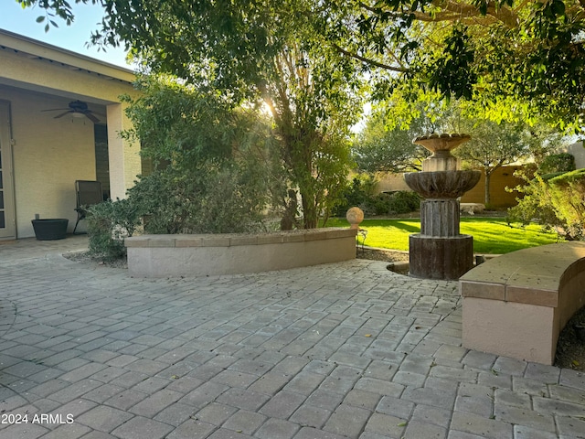 view of patio / terrace featuring ceiling fan