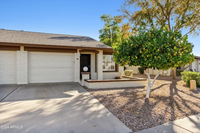 2064 S Farnsworth Dr Unit 39, Mesa, AZ 85209 - ranch-style home featuring driveway, brick siding, roof with shingles, and a garage