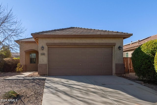 view of front of home with a garage