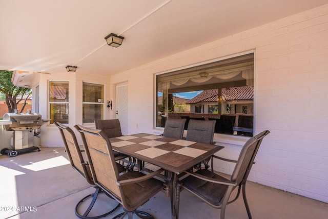 view of patio with a grill