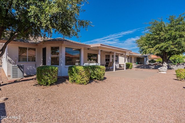 rear view of property with a patio