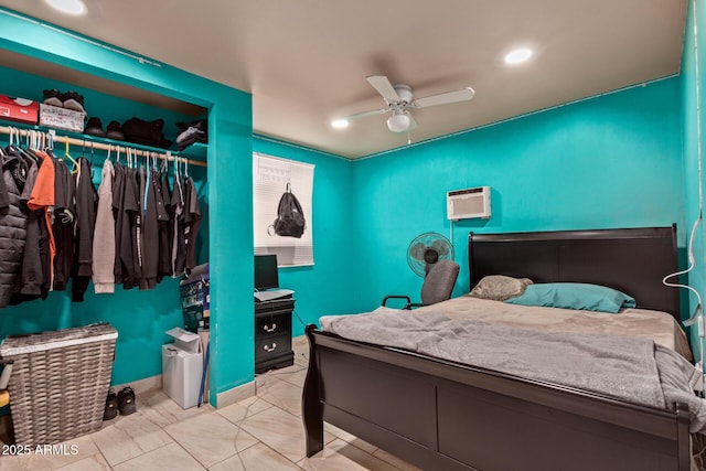 2747 E Wier Ave, Phoenix, AZ 85040 - bedroom with ceiling fan, marble finish floor, recessed lighting, a wall mounted AC, and a closet