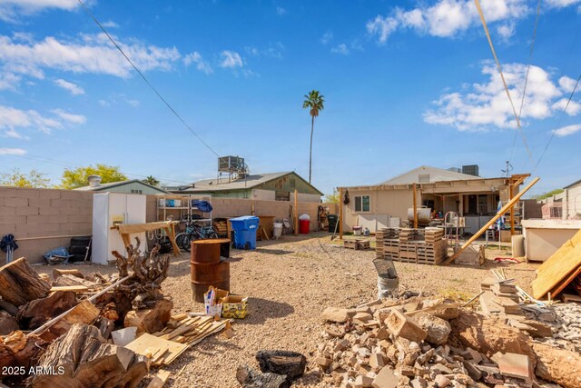 2747 E Wier Ave, Phoenix, AZ 85040 - rear view of property with a fenced backyard and a patio