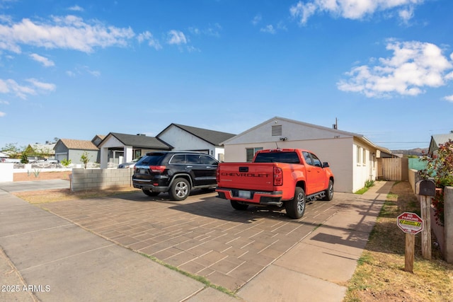 2747 E Wier Ave, Phoenix, AZ 85040 - view of front facade with fence and a residential view