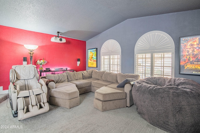 carpeted living room featuring a textured ceiling and vaulted ceiling