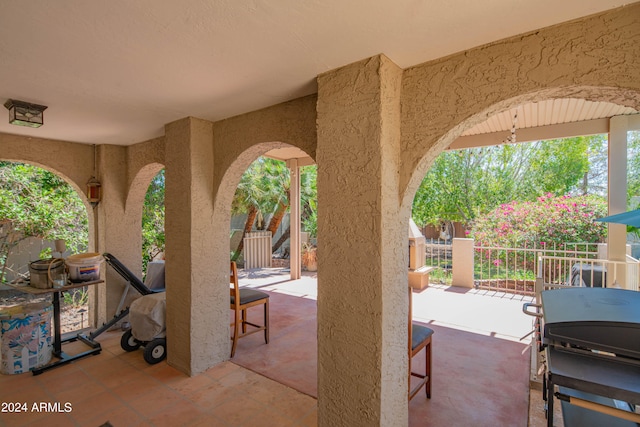 view of patio featuring a grill